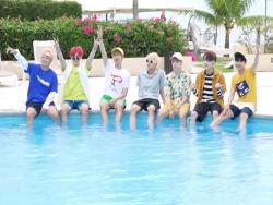 Watch: BTS Lives In The Sunshine And Swims The Sea In Preview For 2018 Summer Package